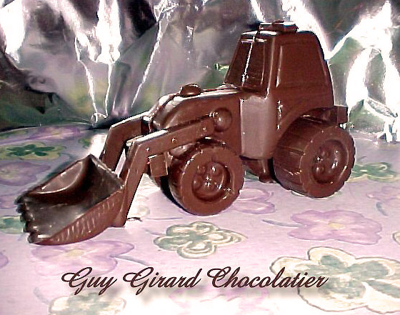 Guy Girard Chocolatier avec son tracteur